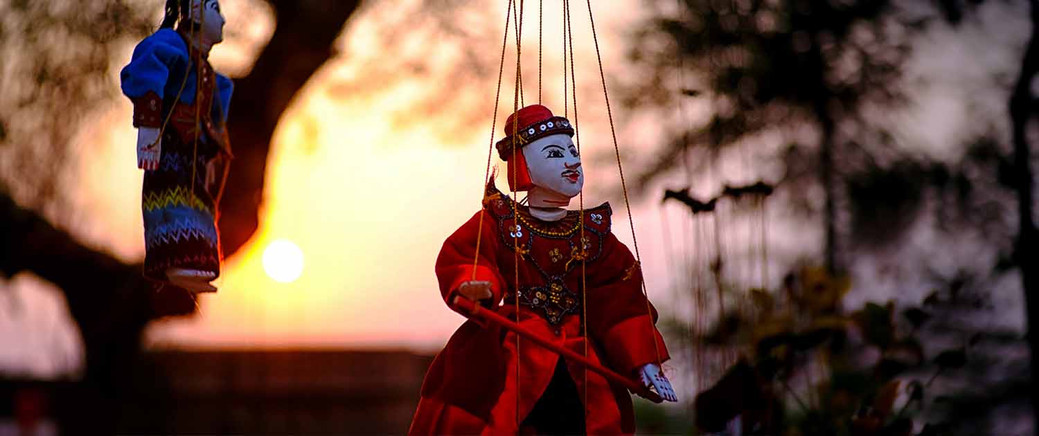 Photo of a puppet on strings