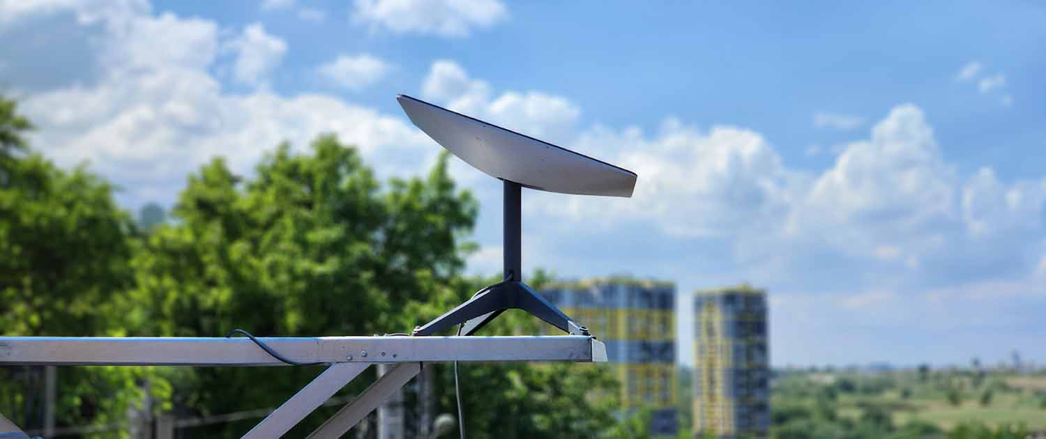 Photo of a Starlink dish on a roof